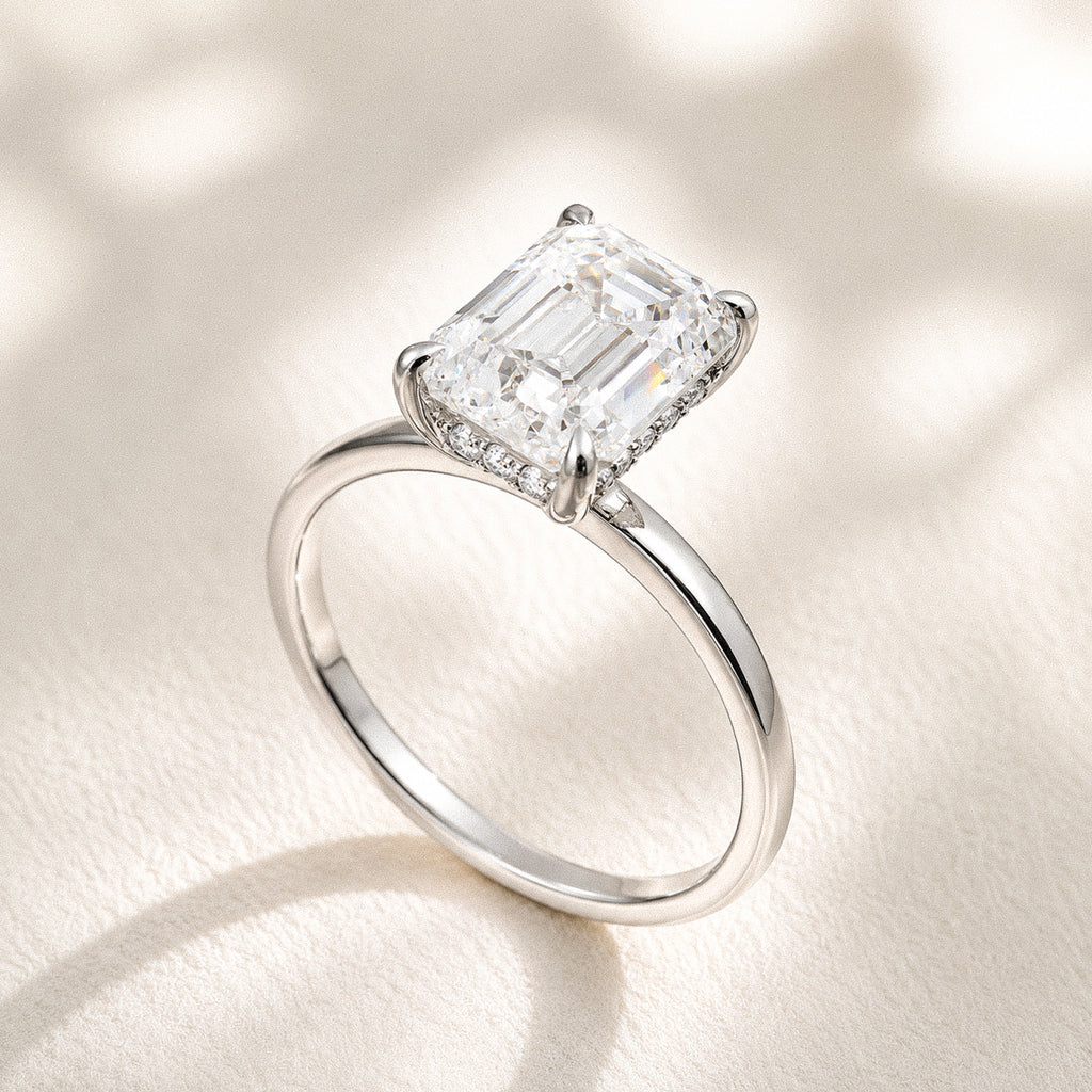 Still Light Emerald Solitaire Ring