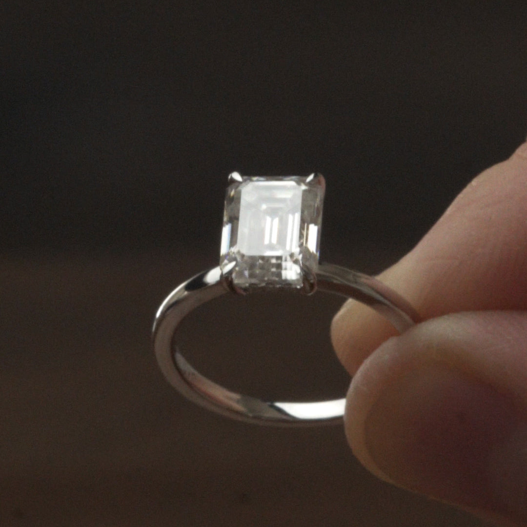 Still Light Emerald Solitaire Ring